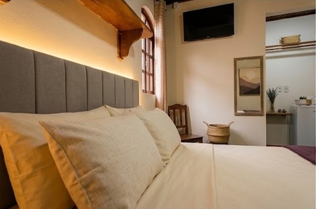 Quarto da suíte casal em Ilha Grande